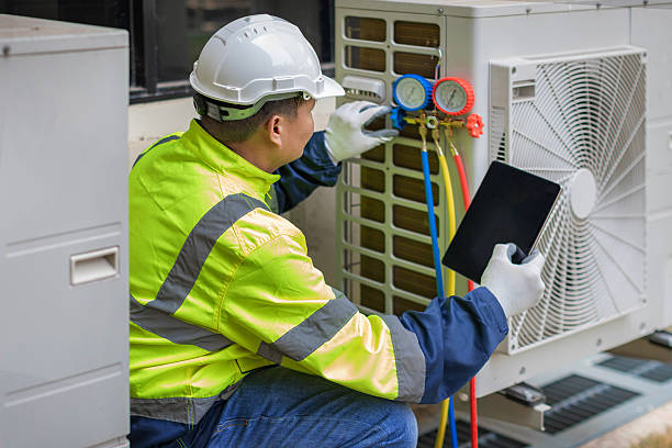 Professional Heat Pump Repair technician working in Hamilton, AL